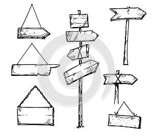 Set of wooden arrow signs, hand drawn vector illustration