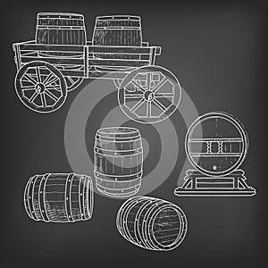 set of wooden barrels in retro style on a black chalk board