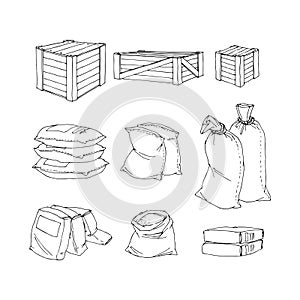 A set of wooden boxes and sandbags. Construction goods.