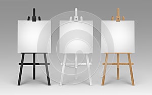 Set of Wooden Brown Black White Sienna Easels with Mock Up Empty Blank Square Canvases Isolated on Background