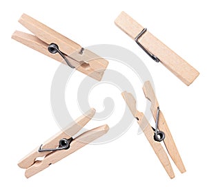 Set of wooden clothespins on a white background. Isolated
