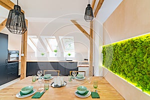 Set wooden table in modern dining room.