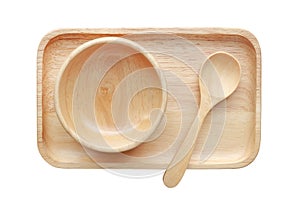 Set of wooden tray, bowl and spoon isolated on white background. Top view