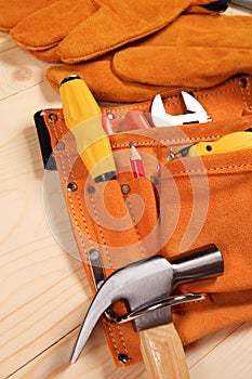 Set of working tools on wooden background