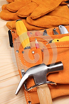 Set of working tools on wooden background