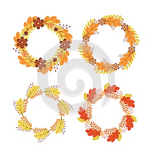 Set of wreaths of colorful autumn leaves and flowers. Fall round frames. Thanksgiving day decorations. Vector elements