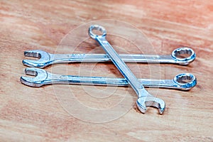 Set of wrenches hand tools for fixing on wood background