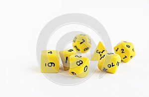 Set of yellow dices for rpg, dnd or board games on light background