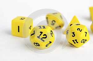 Set of yellow dices for rpg, dnd or board games on white background