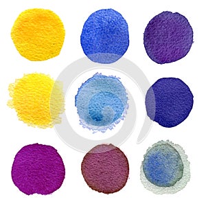 Set of yellow, orange, violet, ultramarine and blue watercolor circles isolated on white background