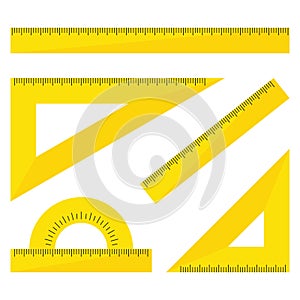 Set of yellow plastic rulers isolated on white background. Ruler, triangle ruler, protractor for school and business.