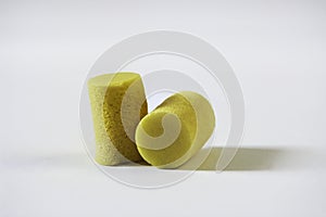 Set of yellow spongy earplugs. photo