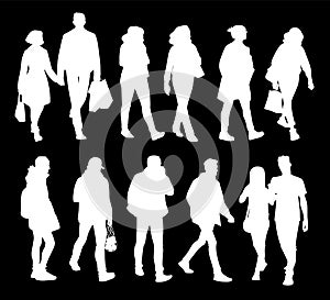 Set of young and adult men and women standing and walking. Monochrome vector illustration of silhouettes of people in