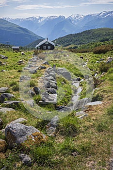 Seter mountain farm landscape along Aurlandsfjellet scenic route near Kvignadal, Norway