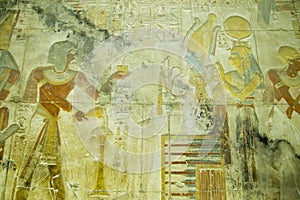 Seti with Osiris and Isis bas relief