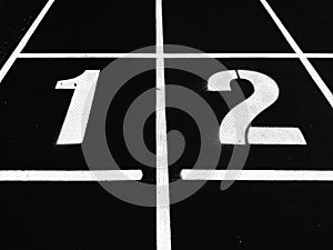 Sets 1 to 8, numbers on blue runway.(black and white photography)