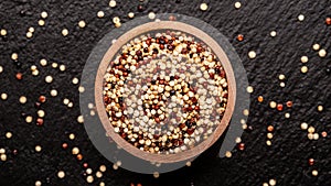 Sets quinoa seeds on a wooden bowl. Healthy and diet superfood product. Long banner format, top view