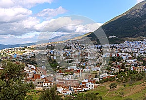 Setting cloud over the beautiful city of Chefchaouen, Morocco, A