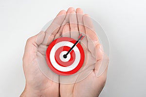 Setting goals, strategy, success concept. Businessman holding target, business targeting, aiming, focus concept. Business