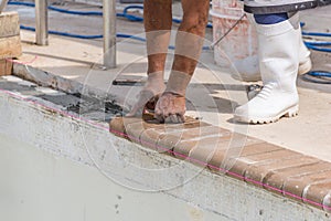 Setting new brick coping pool remodel