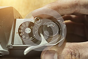 Setting the shutter speed on an analog camera