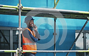 Setting a solid foundation for a strong superstructure. a young man talking on a cellphone while working at a