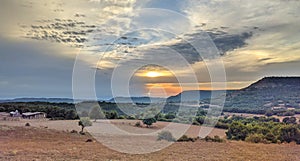 Setting sun on farmer's land in Catalonia