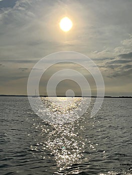 Setting sun on the ocean on a warm September evening