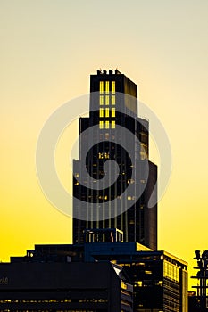 Setting sun over Omaha downtown buildings; FNBO
