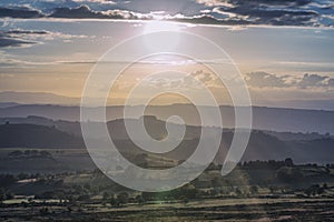 Setting Sun over Scenic Farming Hills in UK