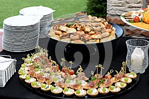 Setting of the table with food for breakfast, bread, beverage, shallow focus, cafe, hotel buffet