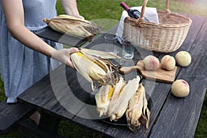 Setting table for a picnic outdoors