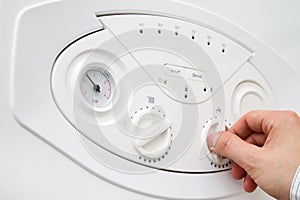 Setting water flow and temperature.