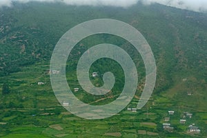 Settlement within mountainous landforms in Paro city Bhutan South Asia photo