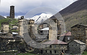 Settlement of Ushguli, with watchtowers in the background of mountains, Svaneti