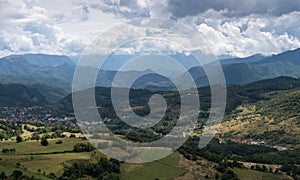 Settlement in valley surrounded with mountains