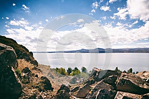 Sevan lake and white clouds blue sky on a sunny day, Armenia