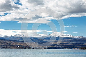 Sevan lake and white clouds blue sky on a sunny day, Armenia