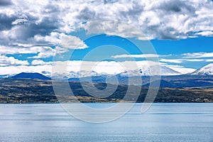 Sevan lake and white clouds blue sky on a sunny day, Armenia