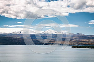 Sevan lake and white clouds blue sky on a sunny day, Armenia