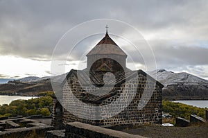 Sevanavank historic armenian orthodox Monastery complex above Sevan lake and snowy mountains