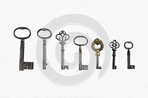 Seven Antique Pipe Keys