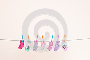Seven Babies Socks On Washing Line Landscape