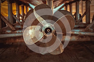 Seven brass blades yacht propeller closeup