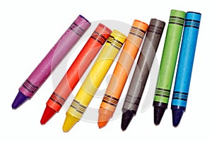 Seven bright colored vax crayons