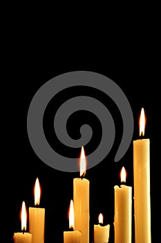 Seven burning candles