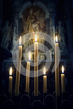 Seven candles in the Christian Church on the icon background. Ab