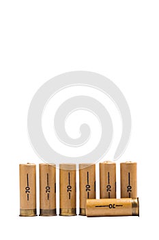 seven cartridges for firearms, on white background