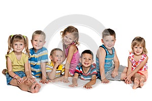 Seven children on the floor