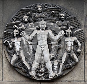 The seven demons. Stone relief at the building of the Faculte de Medicine Paris.